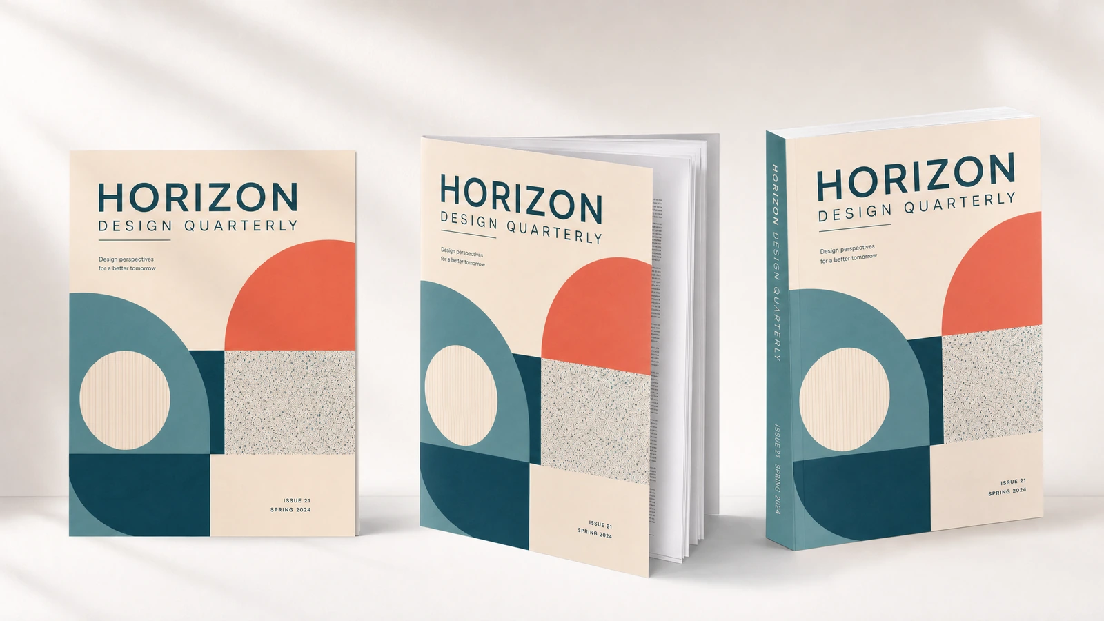 Três exemplares de revistas de design mostrando capas, bordas das páginas e um bloco de páginas aberto