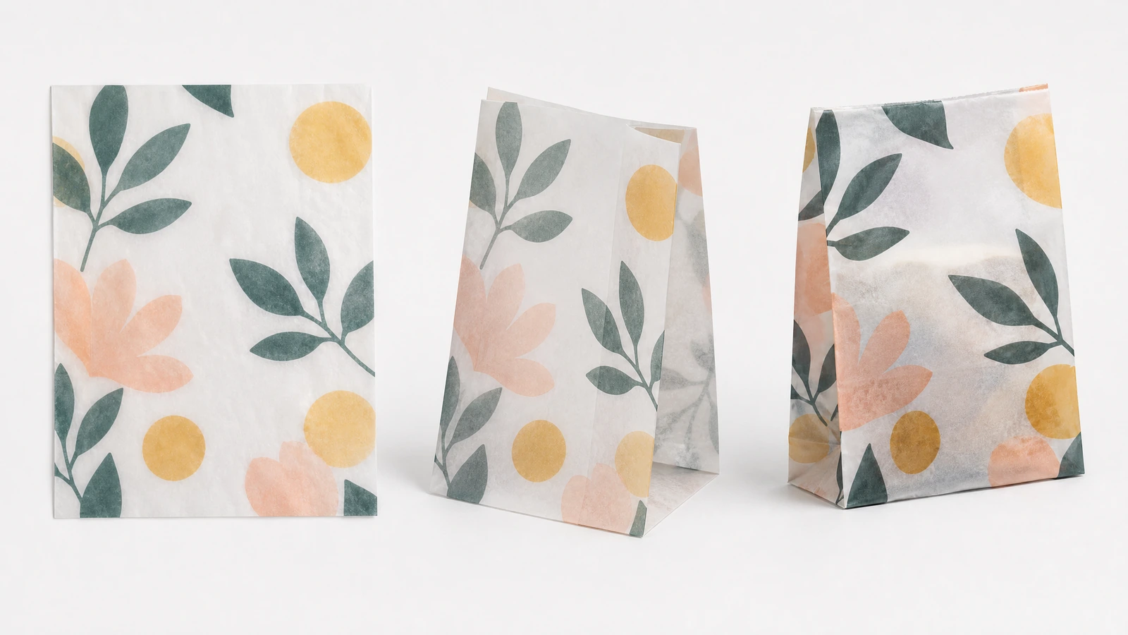 Vistas de sacolas de papel com estampa floral Três sacolas de papel com estampa floral, vistas de pé em diferentes ângulos